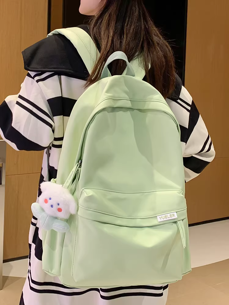 Túi xách dung tích lớn 2025 kiểu mới ba lô nữ túi học sinh cấp hai và cấp ba ba lô cao cấp đơn giản đa năng