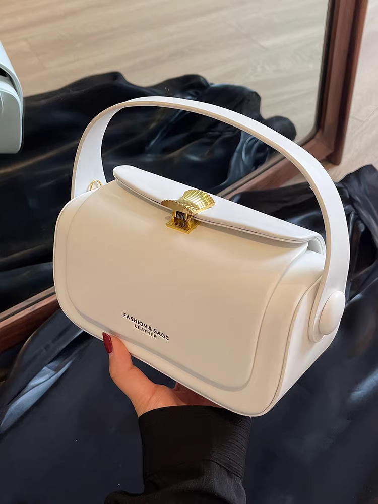 Túi xách nữ cao cấp mùa thu, thiết kế thời trang độc đáo đa năng năm 2025, túi đeo chéo một bên vai, túi cầm tay kiểu gối.