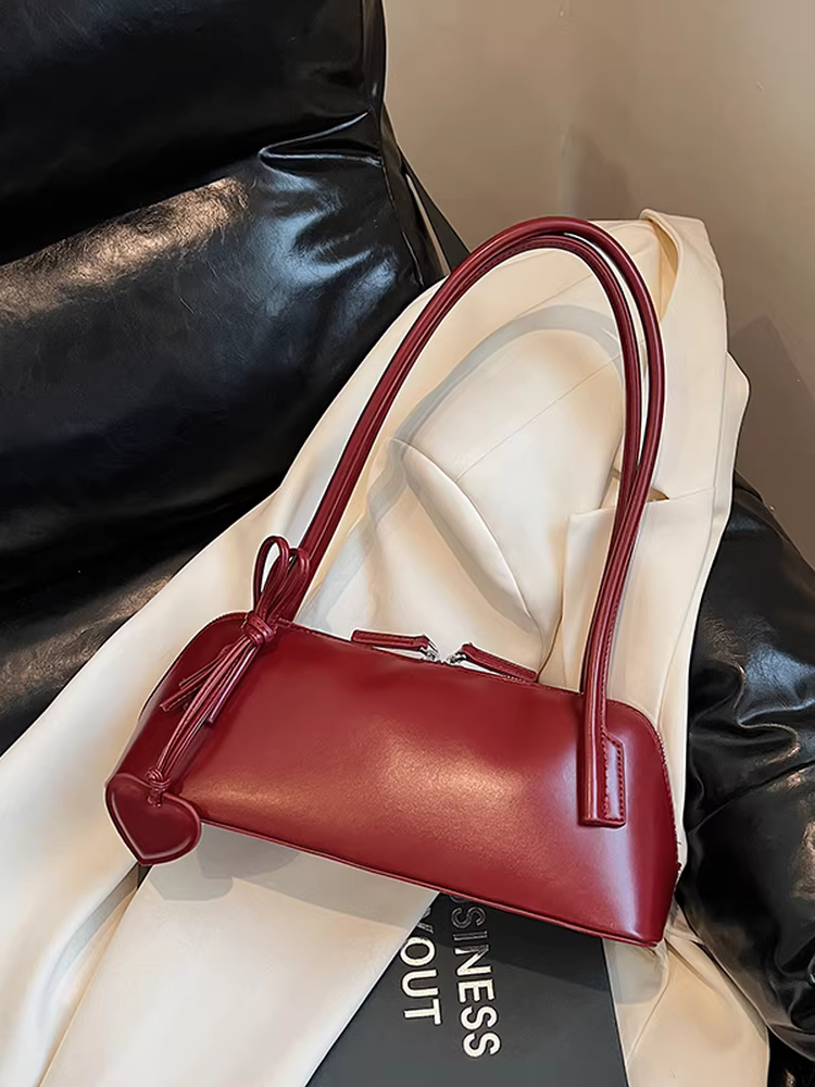 Túi xách nữ dung tích lớn, kiểu dáng mới hè 2025, đơn giản và đa năng, thiết kế độc đáo, túi đeo vai/nách, túi gối thời trang.