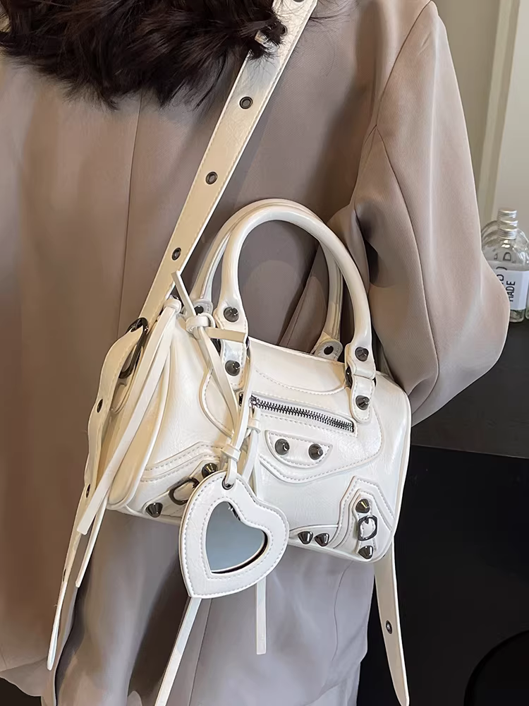 Túi Boston phổ biến năm nay, mẫu túi đeo chéo thiết kế độc đáo mùa thu đông 2025 dành cho nữ, túi xách kiểu retro hình gối.