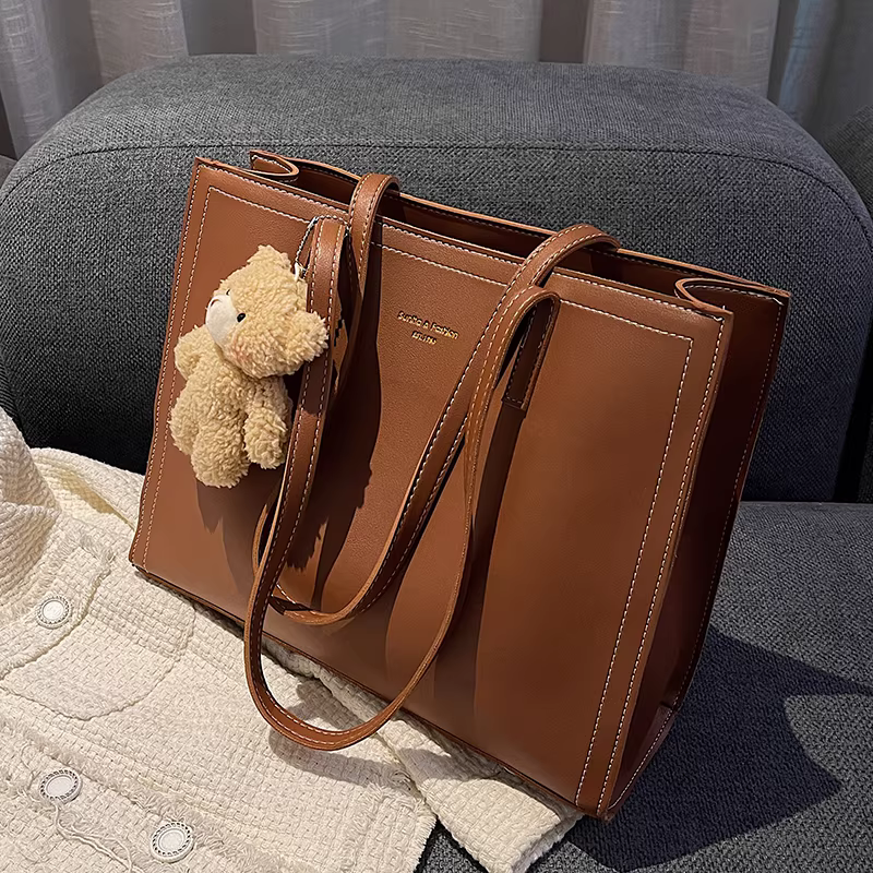 Túi xách nữ cỡ lớn, phong cách độc đáo, mẫu mới xuân hè 2025, túi đeo vai dung tích lớn, túi tote cao cấp.