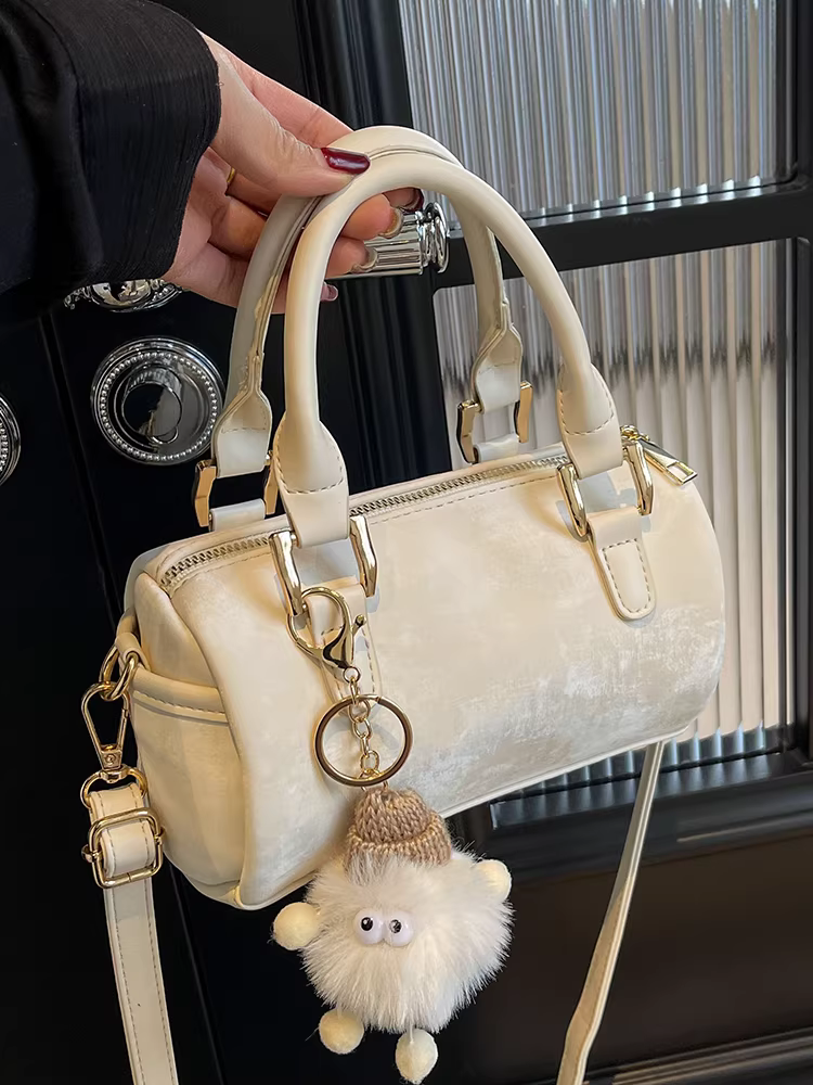 Túi xách nữ 2025 chất liệu cao cấp độc đáo mùa thu đông đa năng đeo vai đeo chéo túi xách tay túi Boston kiểu gối