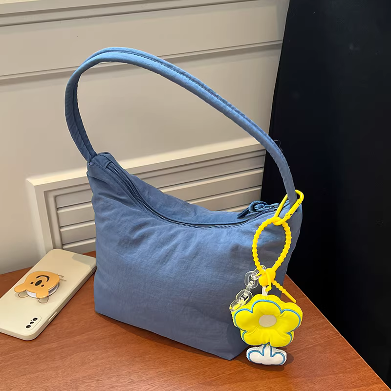 Túi đeo nách cao cấp dành cho nữ, dung tích lớn, mẫu mới thời thượng thu đông 2025, túi đeo vai vải canvas, túi xách kiểu bucket chất liệu độc đáo.