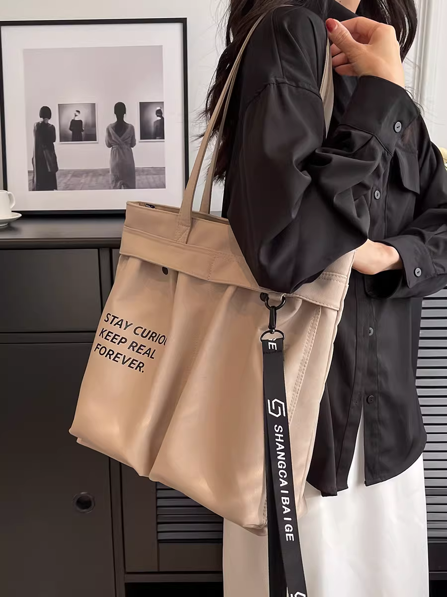 Túi vải canvas nữ, dung tích lớn, kiểu dáng xuân hè 2025 mới, túi đeo vai có họa tiết, đa năng và phổ biến, thích hợp đi học và đi làm, túi tote.