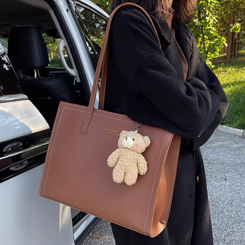 Túi xách nữ cỡ lớn, phong cách độc đáo, mẫu mới xuân hè 2025, túi đeo vai dung tích lớn, túi tote cao cấp.