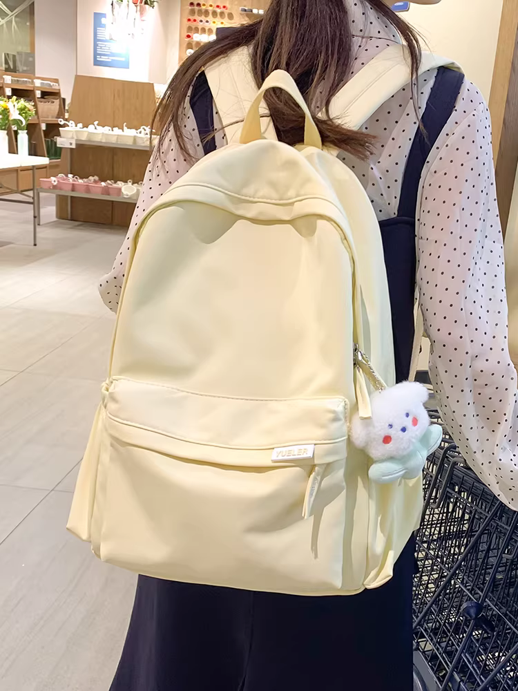 Túi xách dung tích lớn 2025 kiểu mới ba lô nữ túi học sinh cấp hai và cấp ba ba lô cao cấp đơn giản đa năng