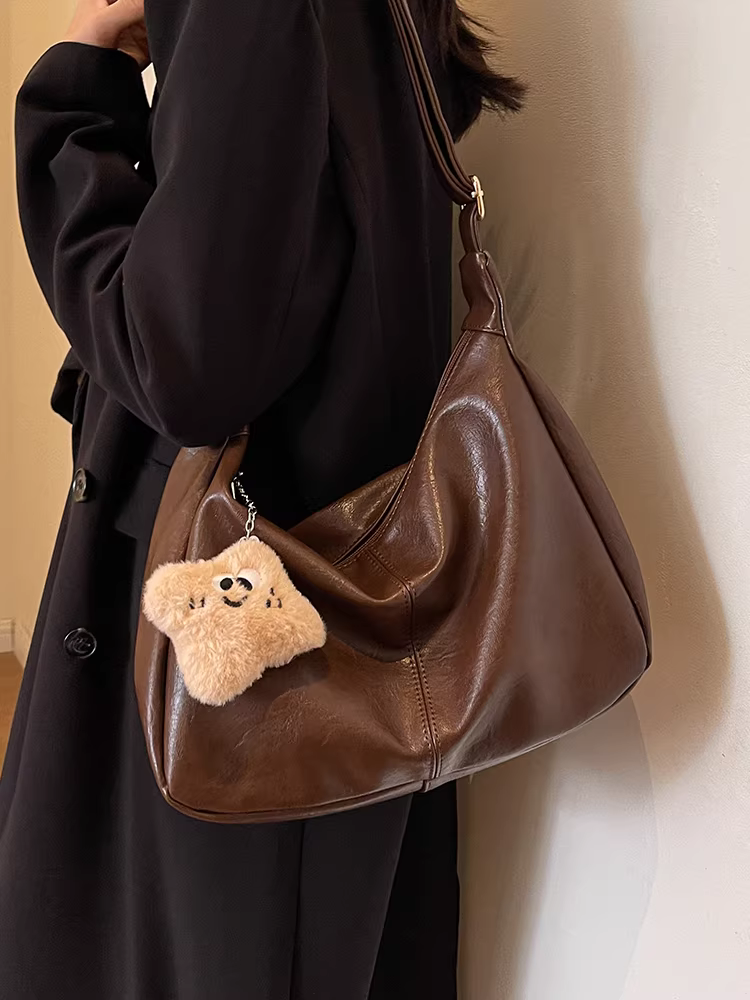 Túi xách nữ cỡ lớn 2025 mẫu mới thu đông, đeo vai, đeo chéo, màu nâu Melard, kiểu dáng cao cấp, kiểu dáng bánh bao, thích hợp đi làm