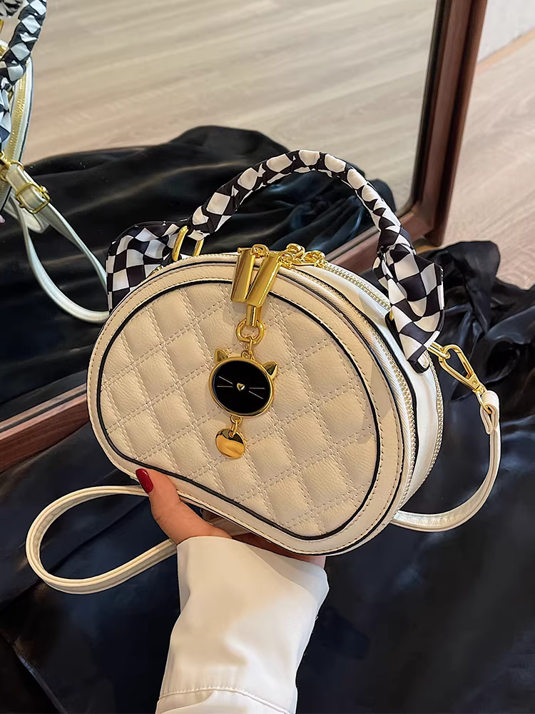 Túi xách thiết kế độc đáo dành cho nữ 2025, túi đeo chéo cao cấp mới, đa năng mùa thu đông, túi xách phổ biến, túi tròn nhỏ may chần bông