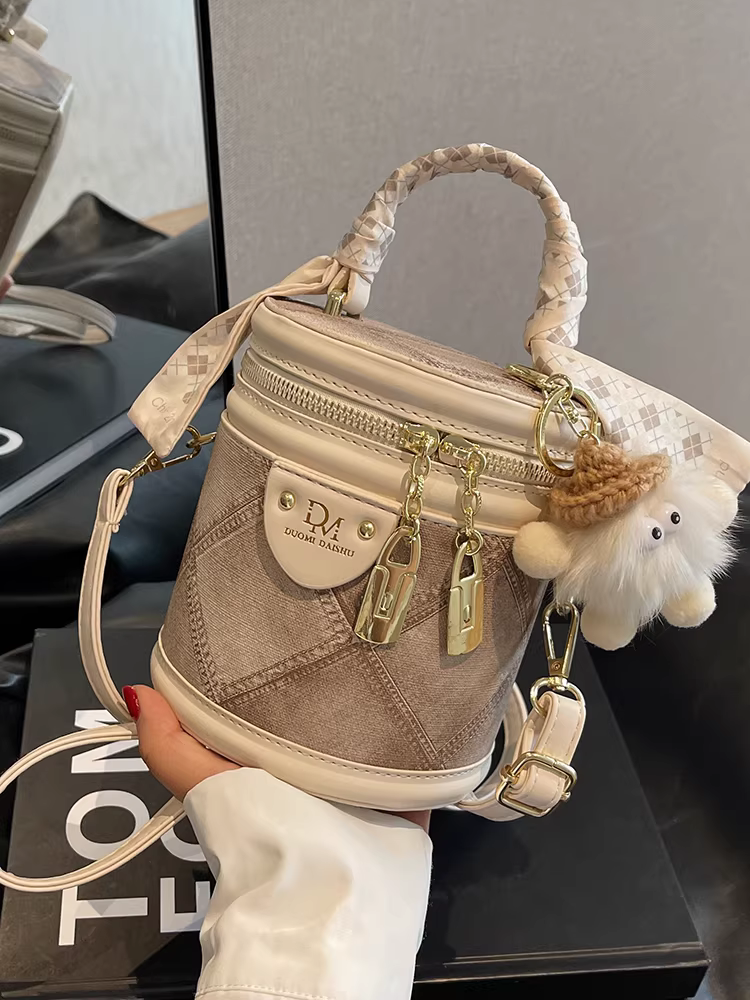 Túi xách nữ độc đáo 2025 thu đông mới, tinh tế và thời trang, túi đeo chéo cao cấp, túi xách tay hình trụ