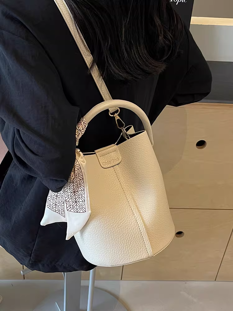 Túi xách retro nữ 2025 mới thu đông cao cấp, cầm tay, đeo vai, thời trang đa năng, chất liệu có vân, đeo chéo