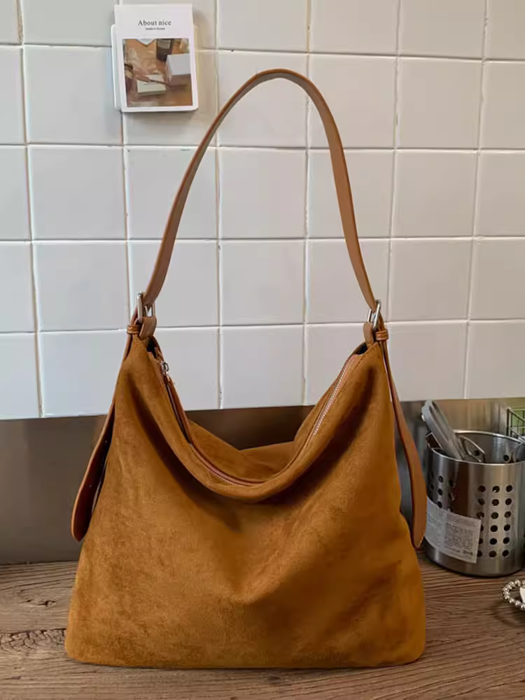 Túi da lộn dành cho nữ, sức chứa lớn, mẫu mới thu đông 2025, kiểu retro mờ, đeo chéo một bên vai, túi đi làm kiểu bánh bao.
