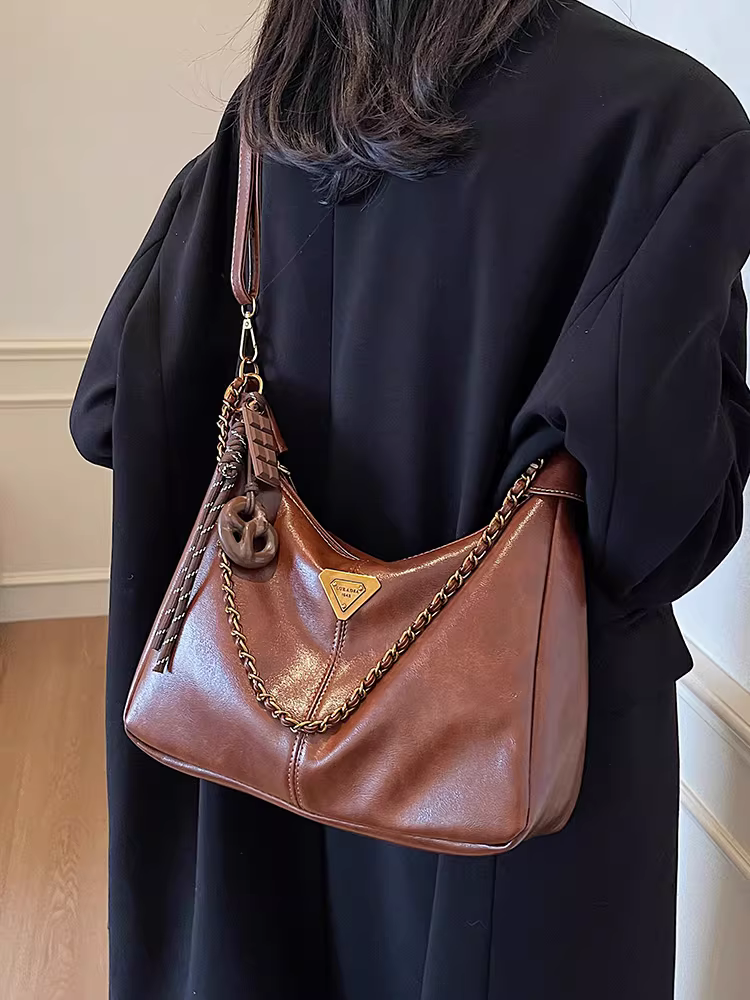 Túi đeo chéo cao cấp dành cho nữ, kiểu dáng hot thu đông 2025, dung tích lớn, phong cách retro đa năng, kiểu dáng bánh bao tiện dụng