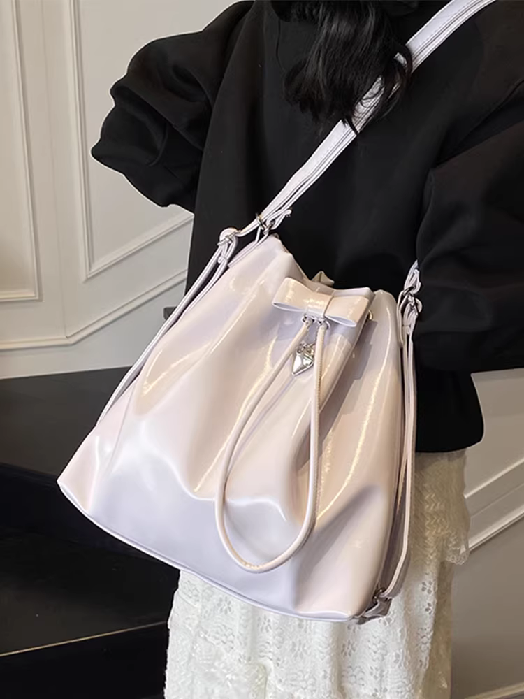 Túi đeo vai cỡ lớn dành cho nữ, thiết kế độc đáo, túi đeo vai dây rút mới năm 2025, ba lô đa chức năng phong cách Hàn Quốc