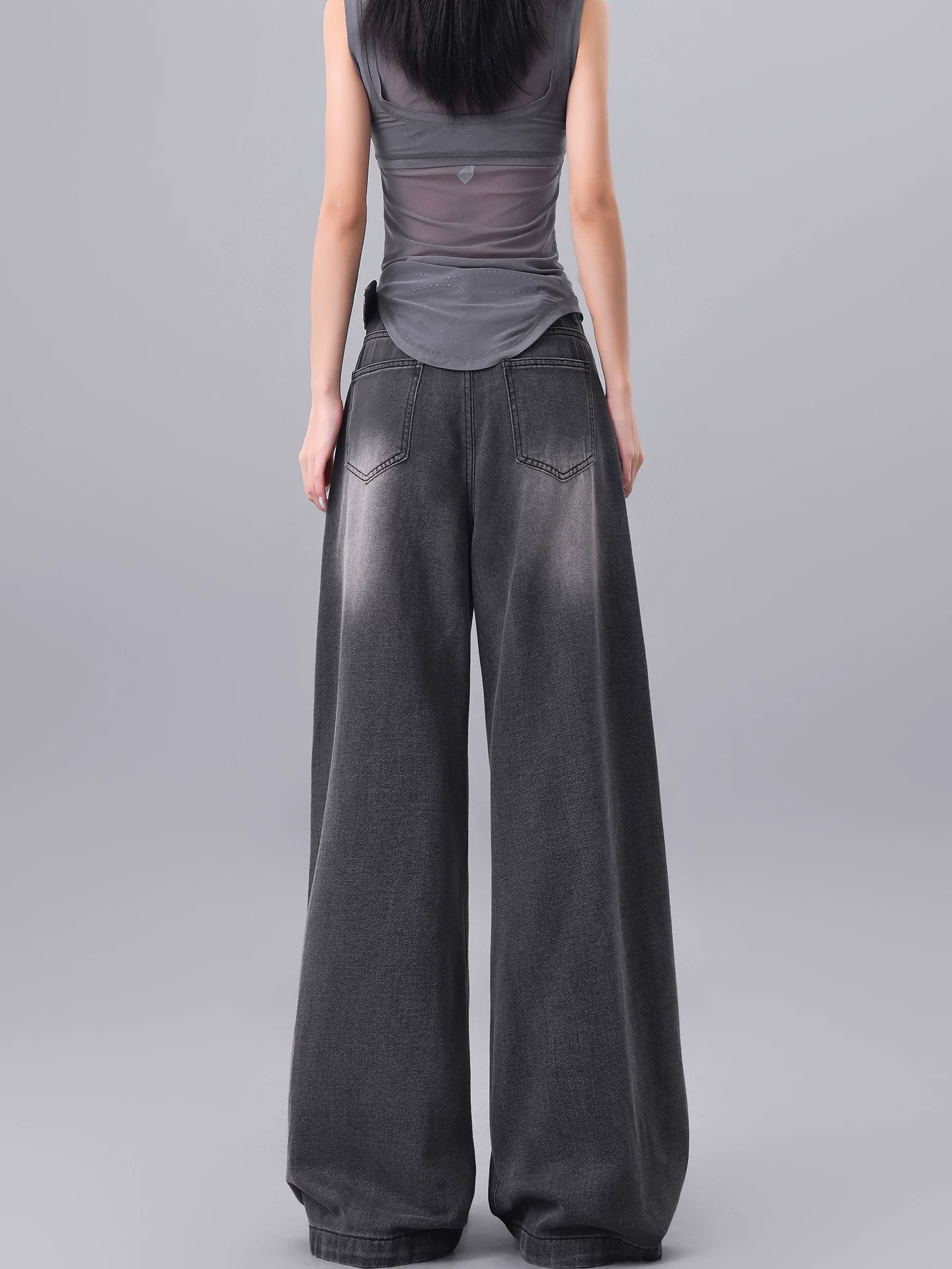 KEN STUDIO Quần jean cargo rách màu đen kiểu Mỹ dành cho nữ với thiết kế độc đáo, quần ống rộng dài đến sàn nhiều túi.