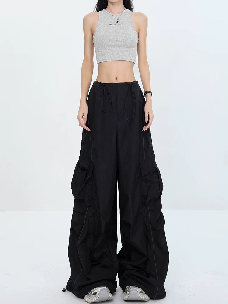 KEN STUDIO phong cách mới mùa hè phong cách đường phố Mỹ màu đen xếp ly dây rút thiết kế eo co giãn quần ống đứng