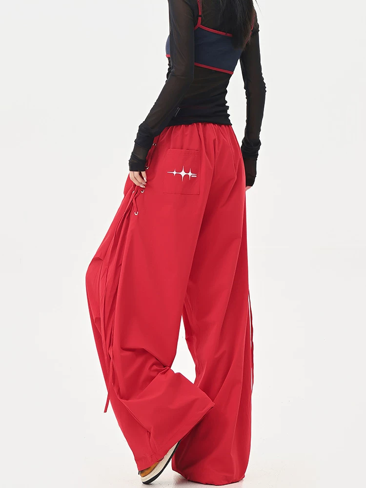 KEN STUDIO mùa hè màu đỏ khiêu vũ đường phố có dây buộc quần thường ngày khô nhanh quần thể thao nữ lưng cao giảm béo quần lính nhảy dù