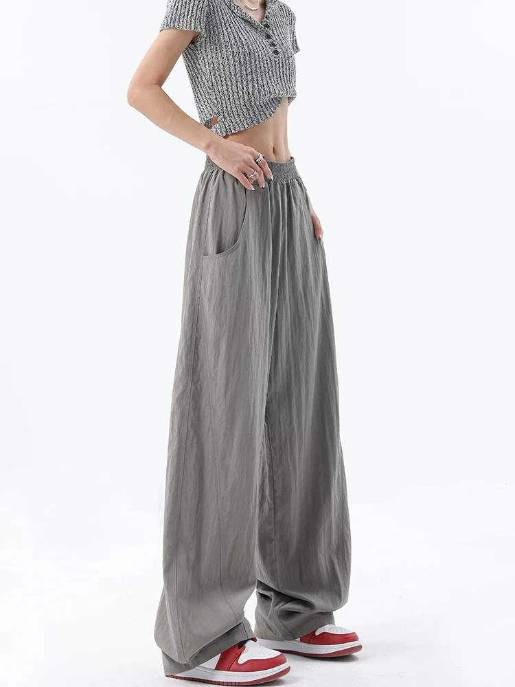 KEN STUDIO thiết kế ban đầu quần ống rộng màu xám băng lụa dành cho nữ mùa hè lưng thun co giãn dáng rộng quần chuối