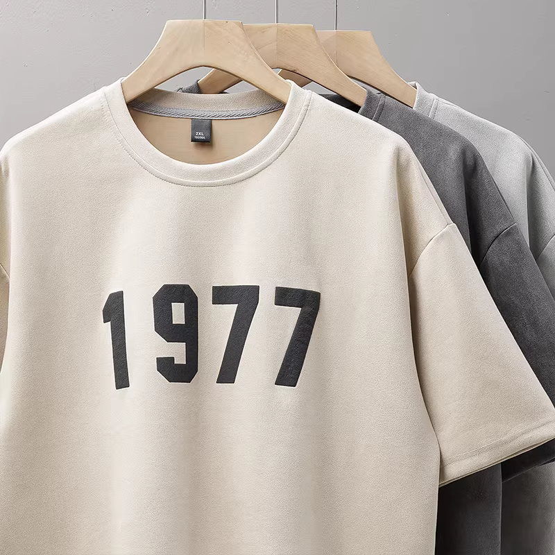 Áo thun da lộn hạng nặng kiểu Mỹ nguyên chất dành cho nam, tay ngắn, in hình bọt xốp 1977, cổ tròn, thiết kế rộng rãi, áo thời thượng.