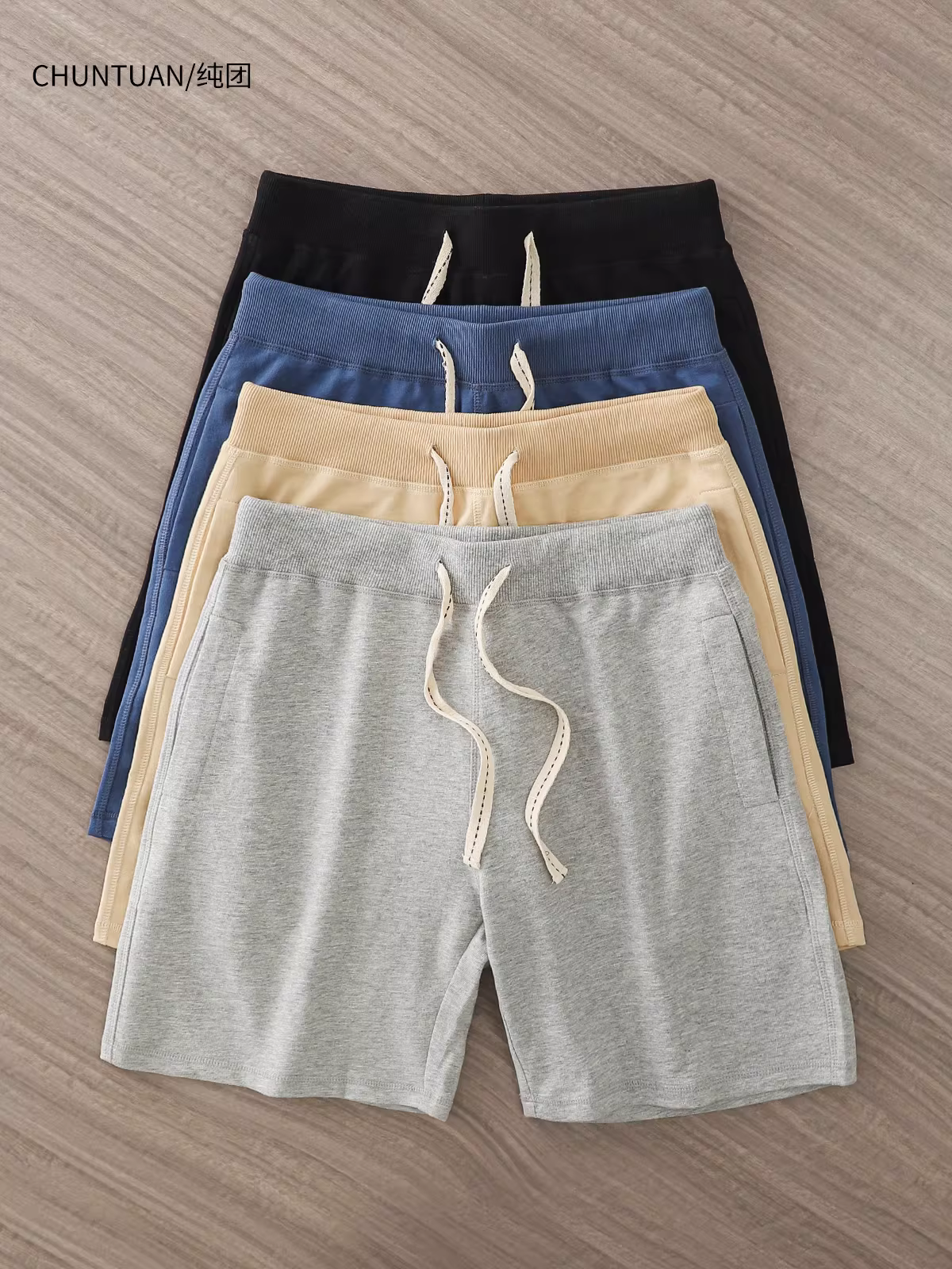 Quần short cotton dày dặn dành cho nam, kiểu mới hè 2024, dáng rộng kiểu Mỹ, quần short dài trung bình mặc ngoài, quần short thể thao rộng rãi năm phần.