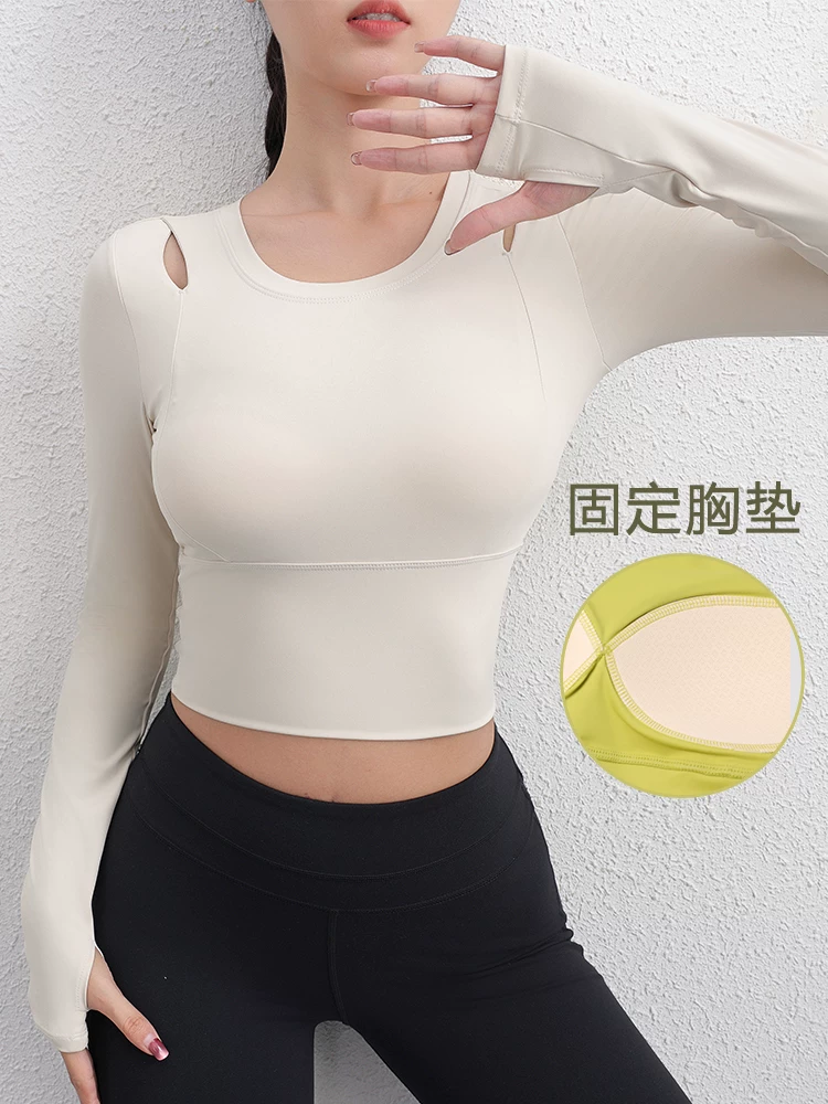 Áo thể thao yoga dài tay khoét lỗ Jiumai Yipin dành cho nữ, kiểu dáng ngắn có cúp ngực cố định, thích hợp cho tập thể dục ngoài trời, mùa xuân.