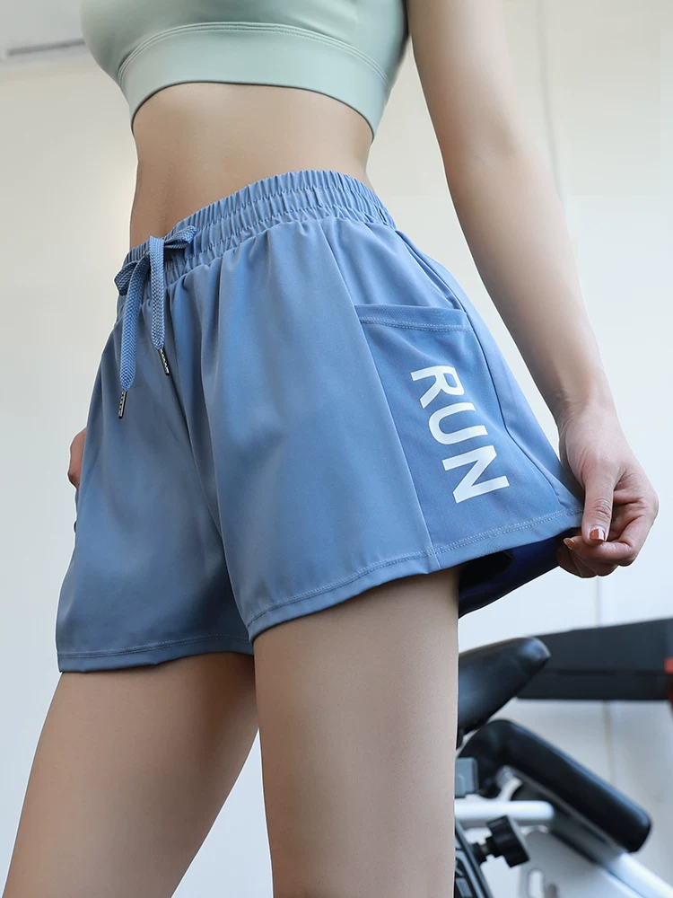 Quần short tập yoga rộng rãi dành cho nữ Jiumai Yipin, quần short tập thể dục nhanh khô chống lộ hàng khi tập chạy bộ.