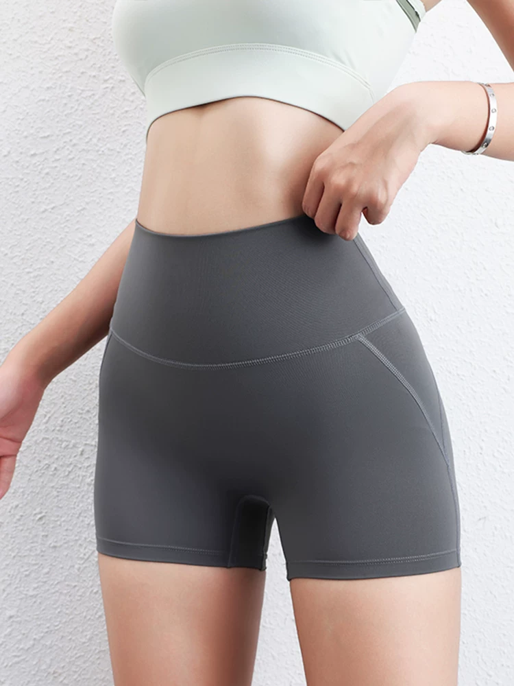 Quần yoga cạp cao có túi rộng, kháng khuẩn, không cần mặc đồ lót, nâng mông, dài ba phần tư, dáng quả đào, co giãn cao, nhanh khô.