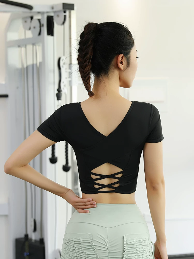 Áo thể thao nữ ngắn tay, kiểu croptop, lưng chéo gợi cảm, chất liệu nhanh khô, có mút ngực, dùng cho tập gym, yoga, áo thun.