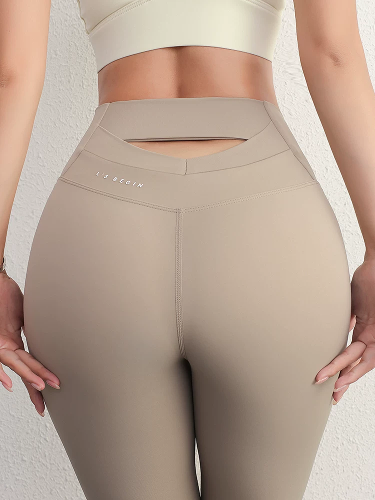 Quần tập yoga Jiumai Yipin dành cho nữ, cạp cao, nâng mông, mùa xuân, co giãn, ôm bụng, khoét lưng, quần legging bó sát, quần tập gym mặc ngoài trời.