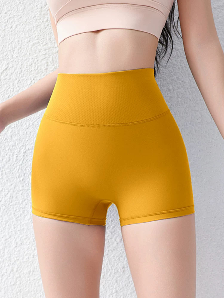 Quần short thể thao nữ kiểu mới, không đường may lộ liễu, cạp cao, nâng mông, bó bụng, quần short yoga cảm giác như không mặc, quần short nữ phong cách dopamine.