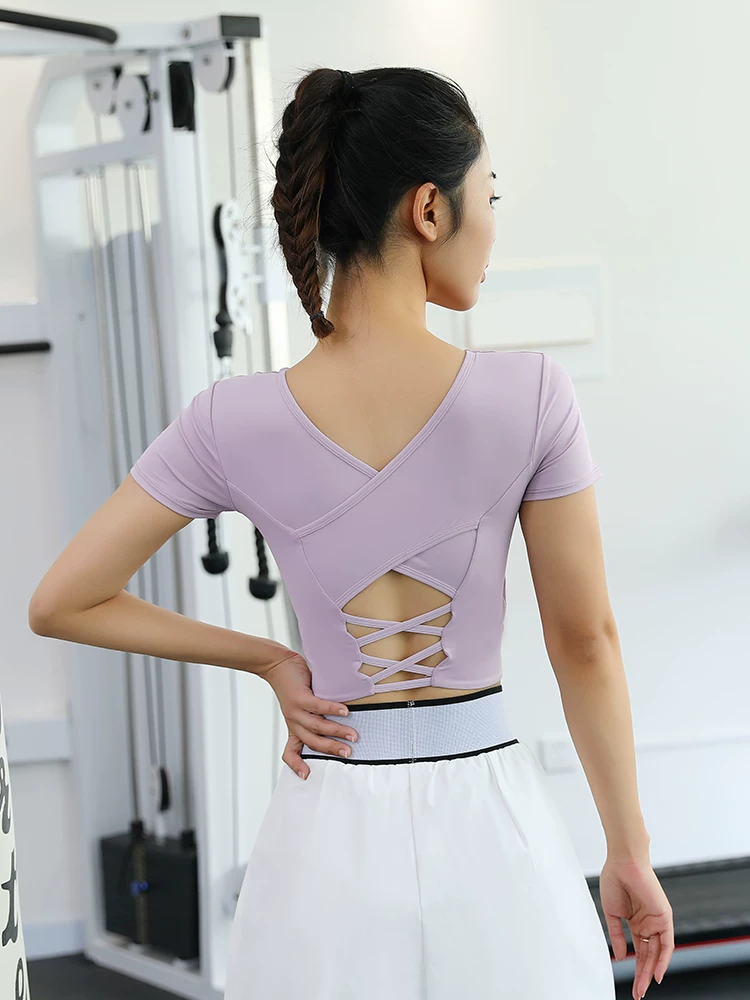 Áo thể thao nữ ngắn tay, kiểu croptop, lưng chéo gợi cảm, chất liệu nhanh khô, có mút ngực, dùng cho tập gym, yoga, áo thun.