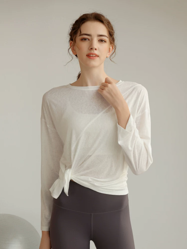 Trang phục tập yoga Tencel hình bông tuyết mới của Jiumai Yipin dành cho nữ, áo khoác thể thao dài tay mùa thu đông, nhanh khô, tôn dáng.