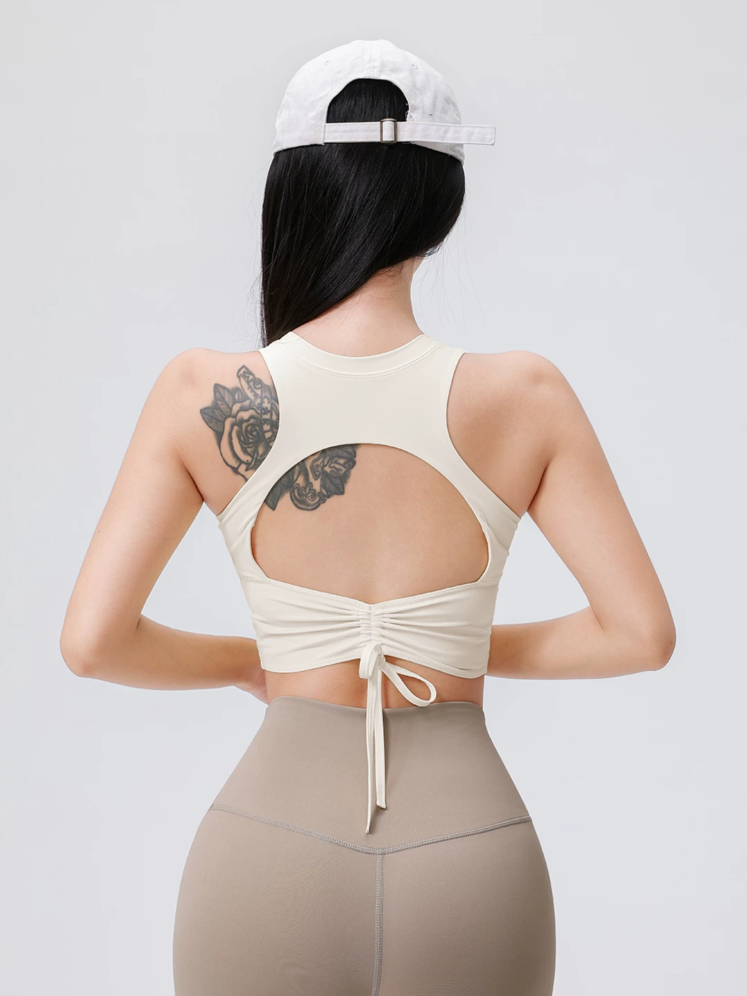 Áo tập yoga dành cho nữ có đệm ngực, thiết kế dây rút rỗng, áo thể thao tôn dáng lưng đẹp dành cho Pilates, chạy bộ, tập luyện và thể hình.