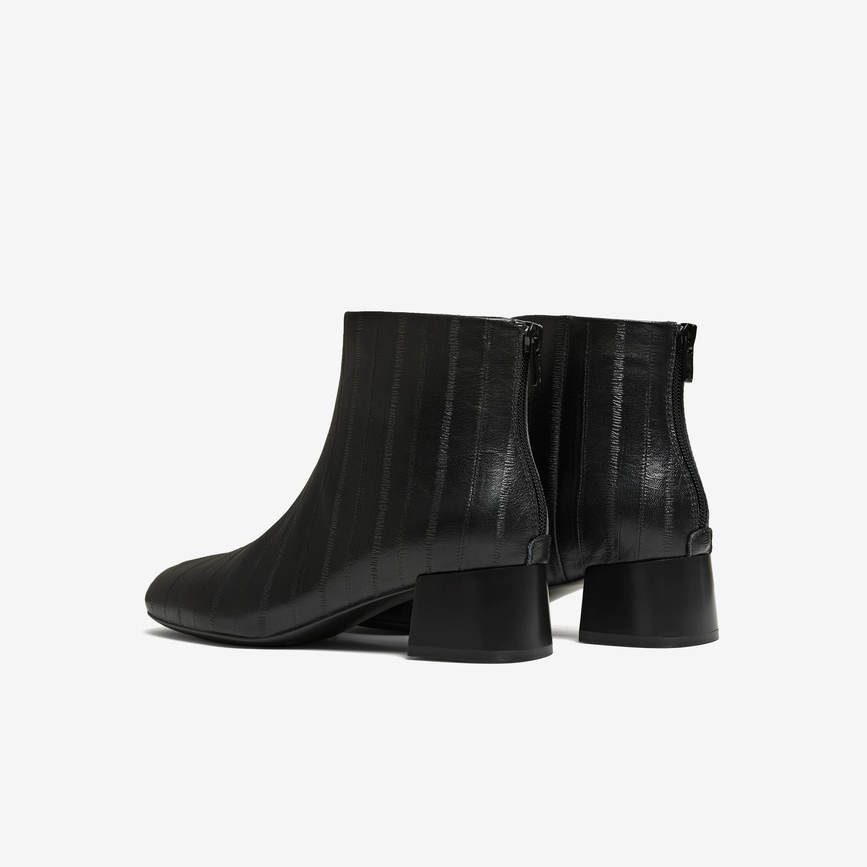 Giày bốt nữ TATA 2025 Giày bốt thời trang mới mùa đông Giày bốt da đen gót nhọn 7ACF4DD5