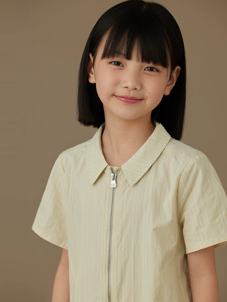 Váy polo ngắn tay màu be cho bé gái, kiểu dáng xuông, thiết kế thời trang, có khóa kéo.