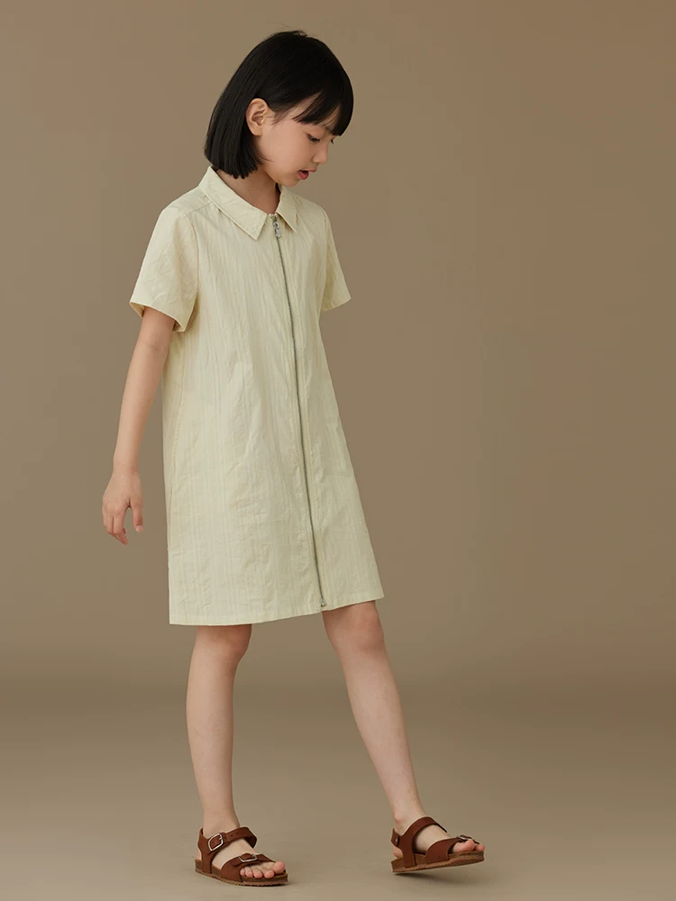 Váy polo ngắn tay màu be cho bé gái, kiểu dáng xuông, thiết kế thời trang, có khóa kéo.