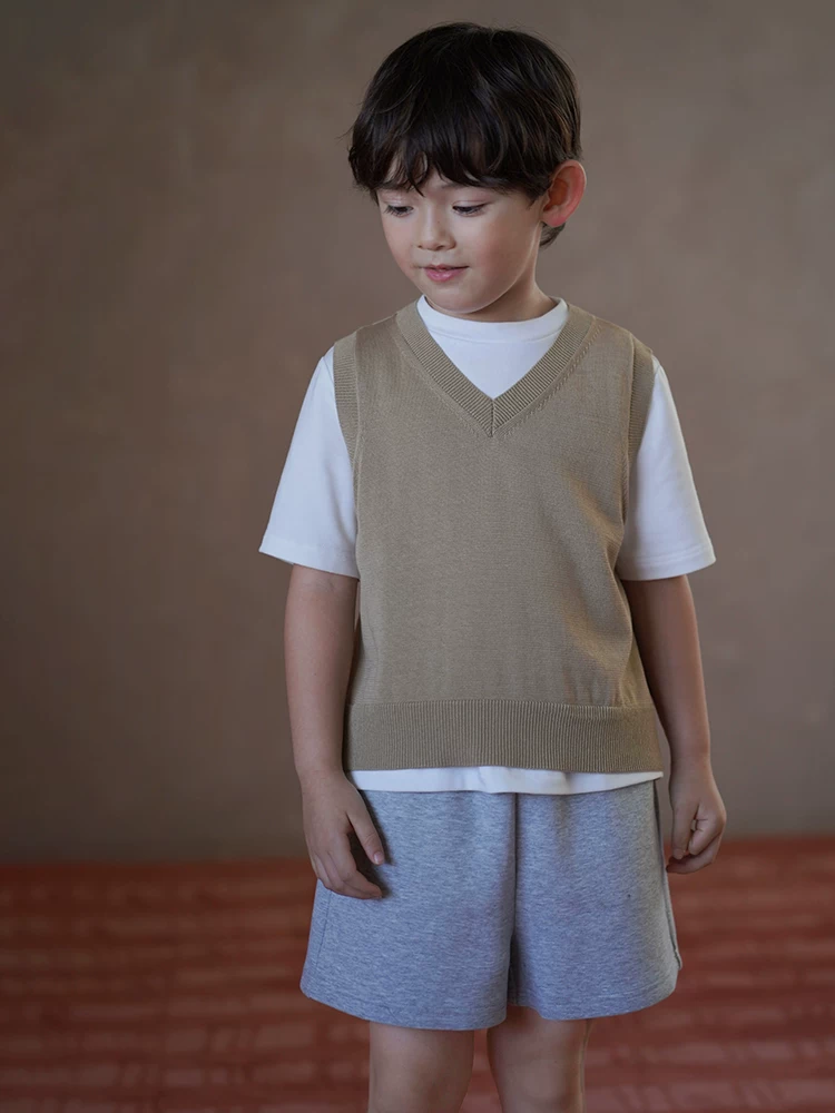 Quần áo trẻ em áo dệt kim mùa xuân thu áo vest kaki đơn giản đa năng áo sơ mi cơ bản cho bé trai và bé gái mang lại cảm giác cao cấp