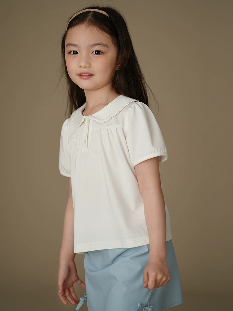 Hazi Quần Áo Trẻ Em Mùa Hè Trắng Dệt Kim Top Bé Búp Bê Cổ Áo Thun Nữ Tay Ngắn Bé Gái Mặc Mùa Hè 25 Kiểu Mới