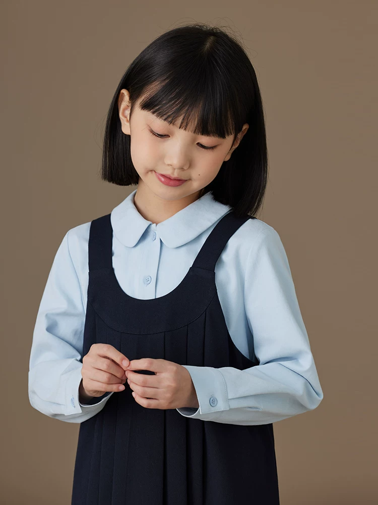 Quần áo trẻ em mùa xuân thu áo sơ mi dài tay màu xanh cotton thân thiện với da cổ búp bê áo sơ mi bé gái phong cách cha mẹ và con cái
