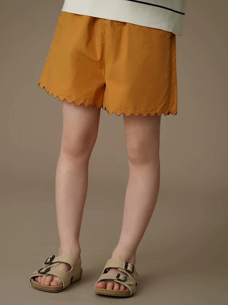 Quần áo trẻ em mùa hè mỏng năm điểm quần short trẻ em quần short giản dị bé gái quần màu vàng gừng thiết kế đơn giản cotton