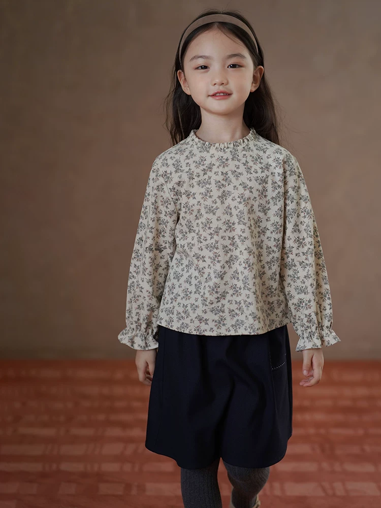 Quần áo trẻ em mùa thu phong cách mới đơn giản dáng rộng váy dài vừa phải cho bé gái váy nửa váy phong cách học sinh cho trẻ lớn mùa xuân và mùa thu