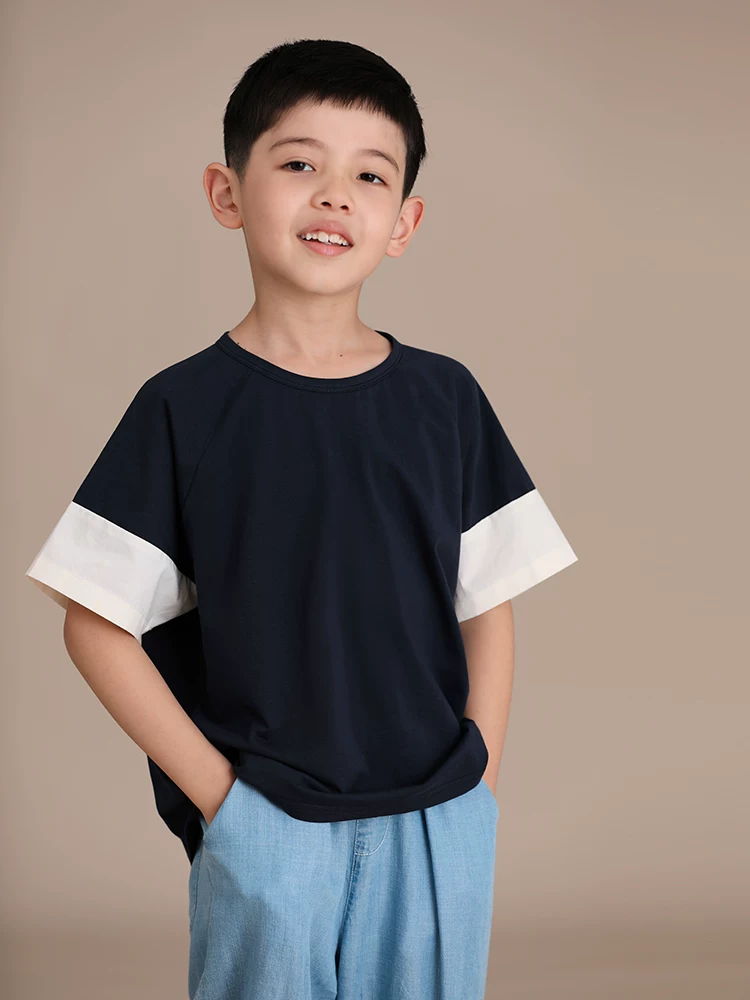 Quần áo trẻ em Hazi Mùa hè mới về Áo thun ngắn tay dành cho bé trai và bé gái màu khối cổ tròn dáng rộng thông thường đa năng