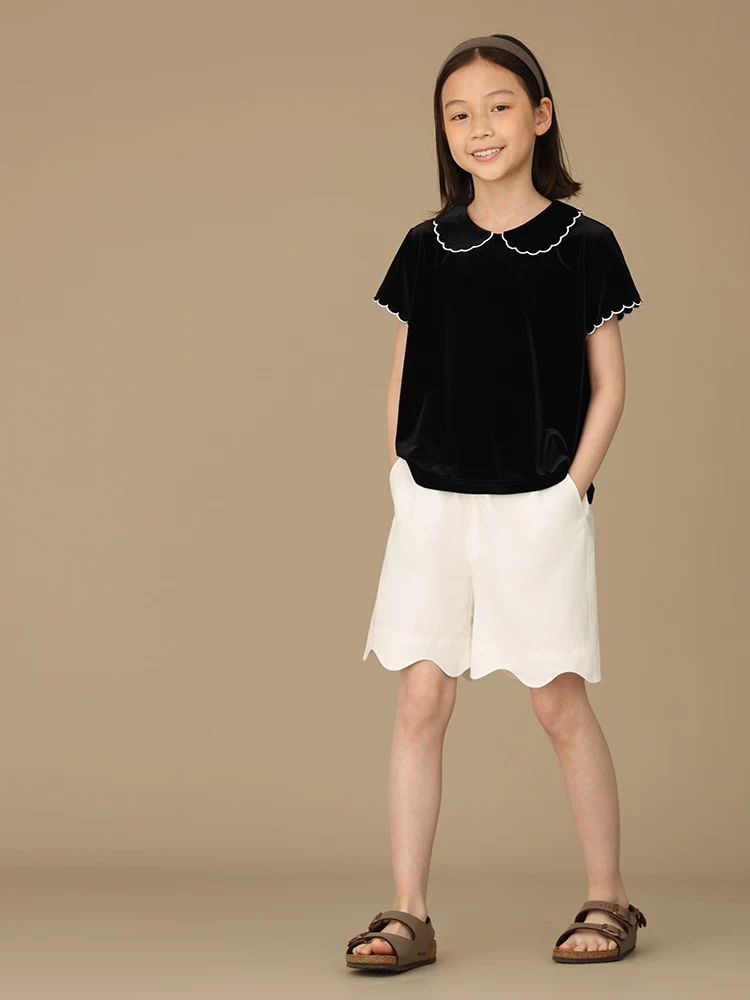 Quần áo trẻ em Hazi Mùa hè mới Quần short cotton nguyên chất có diềm xếp nếp màu trắng chống lộ Quần short phong cách cha mẹ và con cái Quần short thường ngày cho bé gái