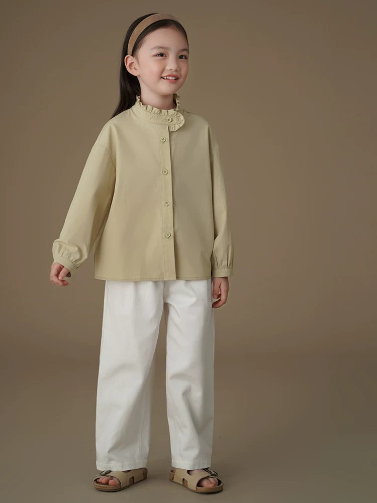 Quần áo trẻ em Hazi Xuân/Hè Phong cách mới Màu xanh đậu Áo trẻ em dáng rộng giản dị Áo sơ mi dài tay cho bé gái Thiết kế đơn giản