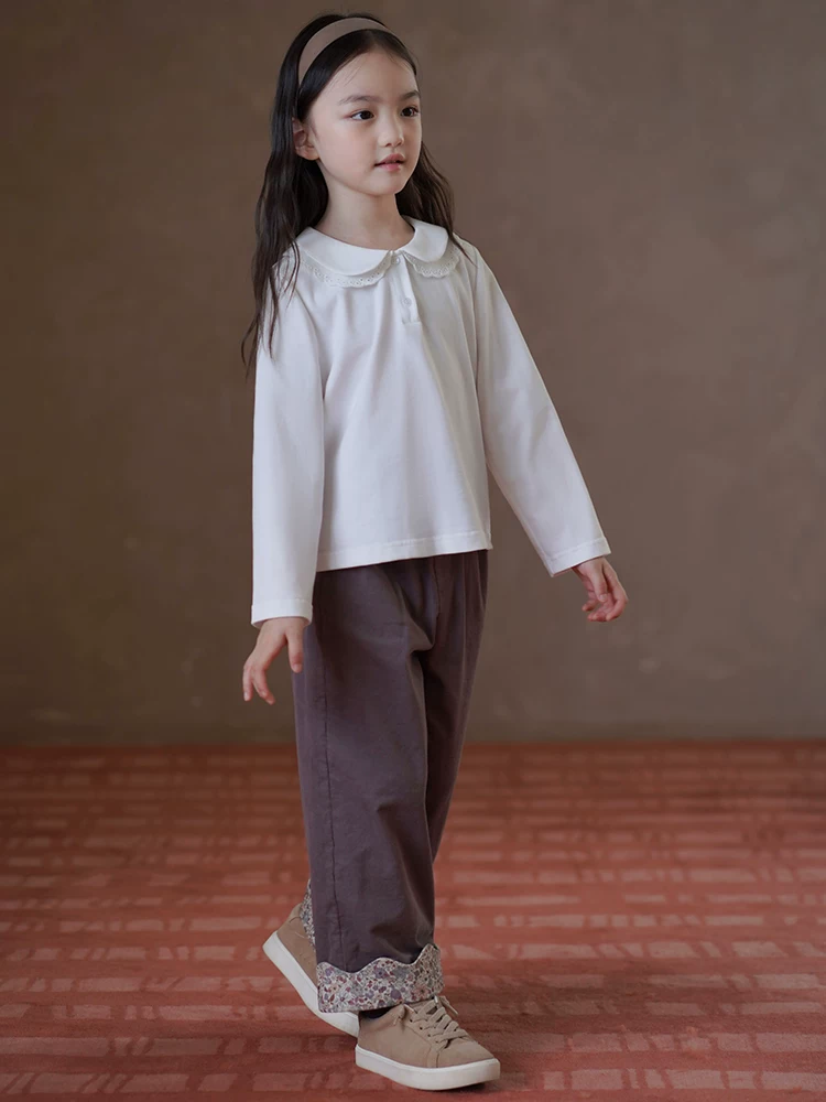 Quần áo trẻ em mùa thu phong cách mới cổ búp bê áo dệt kim bé gái áo thun dài tay áo sơ mi nữ mùa thu đông