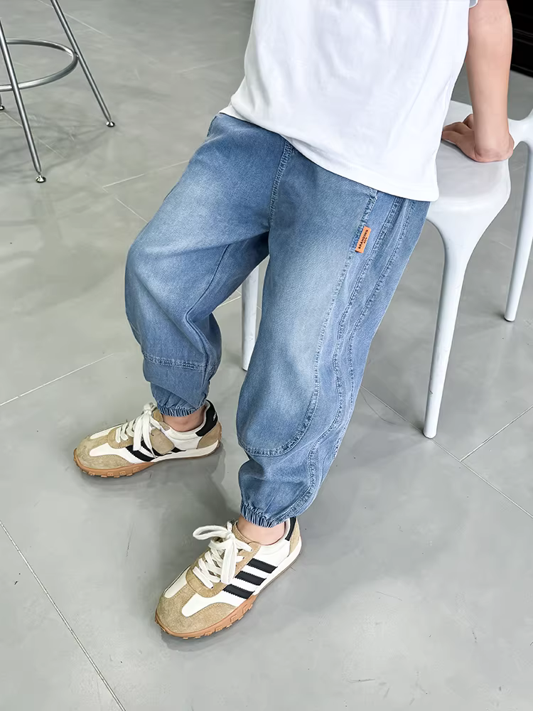 Quần bé trai mùa hè kiểu dáng mỏng, quần jean Tencel trẻ em kiểu dáng hè, quần chống muỗi cho bé trai đẹp trai, mặc hè mẫu mới 2025