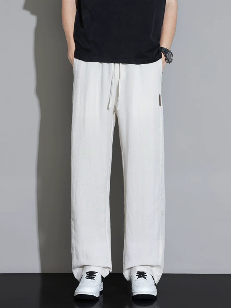 Quần dài ống đứng Lyocell cao cấp của Jeanswest dành cho nam, quần dài dáng rộng đa năng phong cách Mỹ mùa xuân thu.