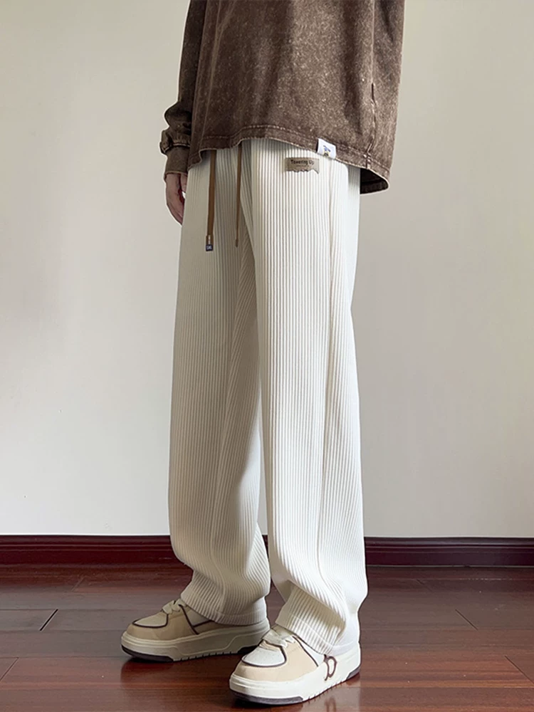Quần jeanswest đơn giản màu trơn đa năng dành cho nam giới, quần ống rộng thẳng hợp thời trang mùa xuân mới.