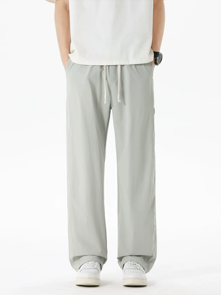 Quần jeanswest ống rộng phong cách Mỹ thời thượng dành cho nam, mùa xuân thu, dáng rộng cao cấp, quần thể thao đa năng.