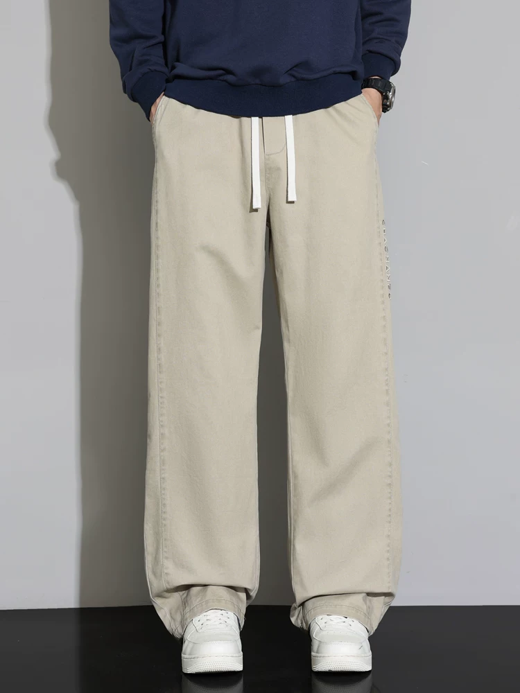 Quần kaki nam Jeanswest 100% cotton nguyên chất, mùa xuân thu, chất liệu cao cấp, dáng rộng, quần dài đa năng, phong cách thường ngày.