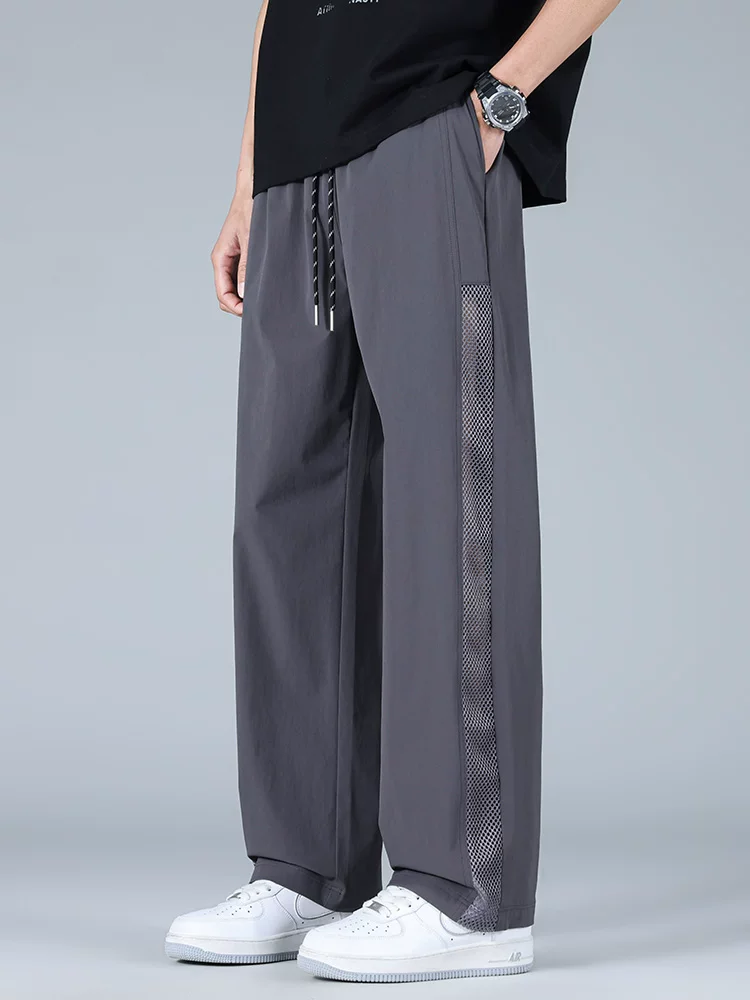 Quần dài ống đứng chất liệu lụa băng kiểu Mỹ của Jeanswest dành cho nam, quần dài thoáng mát mùa hè, dáng rộng hợp thời trang, thân thiện với làn da, thoáng khí.